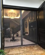Cửa chống muỗi bánh xe đồng